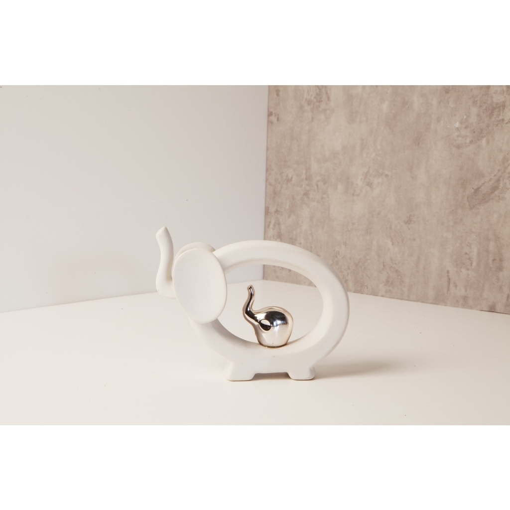 Elefante bianco in modello stilizzato con elefantino in argento - 23164r