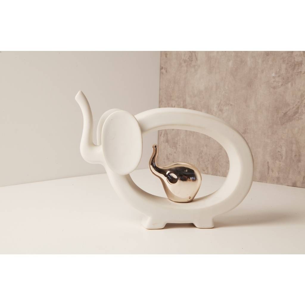 Elefante bianco in modello stilizzato con elefantino in argento - 23165r